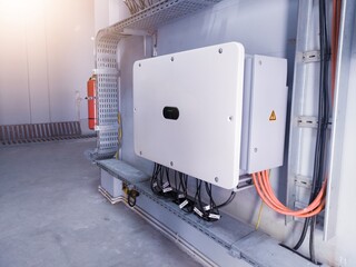 Instalation control of inverters solar panel on the wall. Technology of solar energy with shiny...