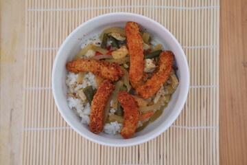 rice and pumpkin vegetables with chicken nuggets