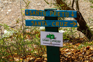 Signpost of the hiking trail in the mountains of Curaçao