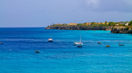 Boats in the turquoise water of the Caribbean Sea, Curaçao.