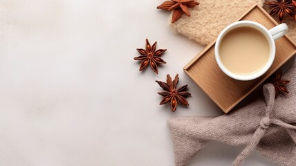 Autumn or winter composition. Gift box Coffee cup, cinnamon sticks, anise stars, beige sweater with knitted blanket on cream color gray fluffy background. Flat lay top view copy space, generative ai