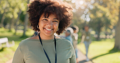 Black woman, happy and portrait in park for charity, volunteer and community service work with donation. African person, smile and green outdoor for change, project or sustainability with NGO support