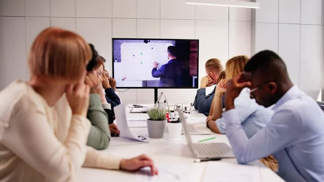 Bored Employee In Video Conference Training