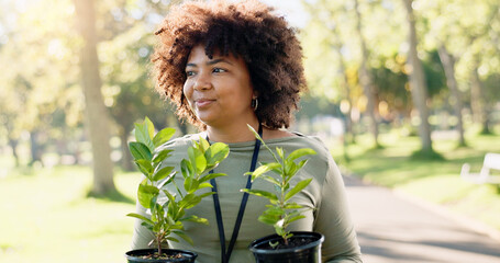 Volunteer, woman and plants at park for gardening, earth day and thinking of sustainability in...