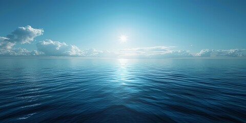 Obraz premium A tranquil sea stretching into the horizon beneath a cloudless summer blue sky