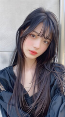 自撮りをしているアジア人女性