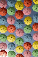 multi-color umbrella display hanging high over a street in Jerusalem, Israel