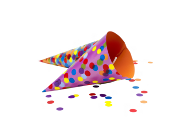 Two party hats with colorful polka dots are on the ground