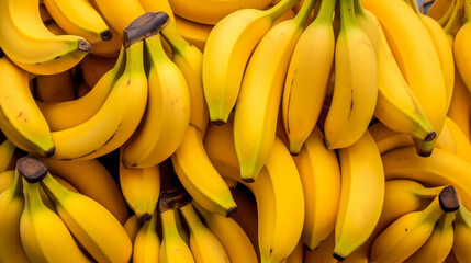 Vibrant image of ripe bananas on a highquality background, showcasing the delicious yellow fruit known for its rich potassium content.