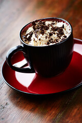 Coffee with whipped cream on dark wooden background. Close up.
