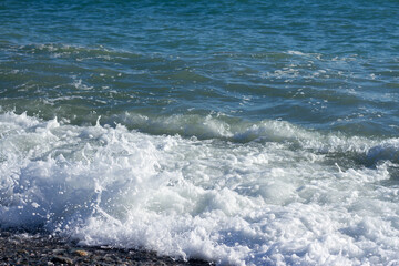 Sea wave crashing on the shore
