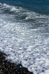 Sea wave crashing on the shore