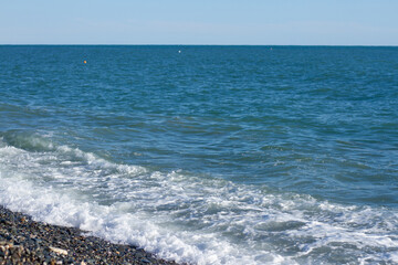 Sea wave crashing on the shore