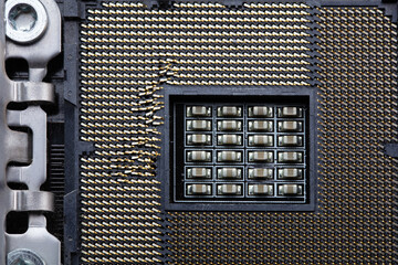 Damaged CPU socket. CPU socket with bent CPU contact terminals.