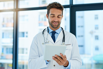 Hospital, healthcare and man doctor with tablet for patient diagnosis, review charts or...