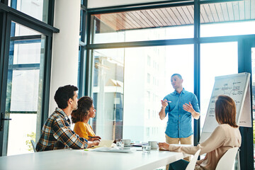 Business people, man and presentation in conference room with discussion for company growth and...