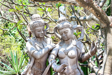 The garden has old stone statues in a peaceful ambiance, infusing history and culture
