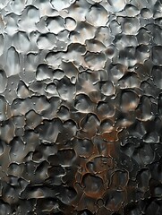 Fototapeta premium Close-up of Textured Dark Metallic Surface