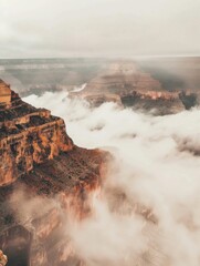 Fototapeta premium Fantasy USA Arizona Landscape with Grand Canyon and Misty Clouds Perfect for Nature Posters and Travel Photography