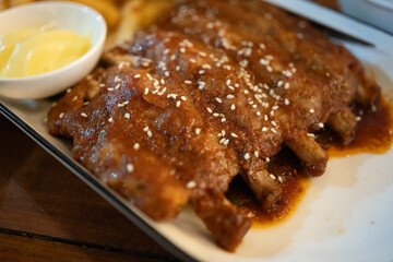 Delicious succulent pork ribs baked with honey. Close up