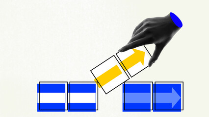 Changing direction of movements. Human hand replacing one block with arrow going upwards....