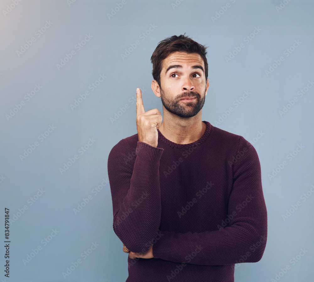 Poster Solution, thinking and man with ideas, decision and problem solving on grey studio background. Person, model and guy with wonder, choice and thoughts with questions, inspiration and planning with why