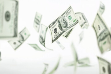 Hundred Dollar Bills Flying on White Background - Powered by Adobe