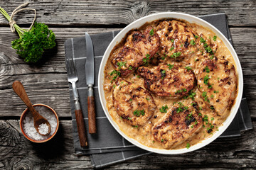 creamy smothered pork chops cooked in onion gravy