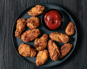 american style fried chicken wings on a plate