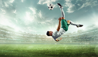 Dynamic cinematic shot of professional soccer athlete in action on stadium with flashlights, kicking ball in mid air for winning goal. Concept of professional sport, championship, tournament, match.