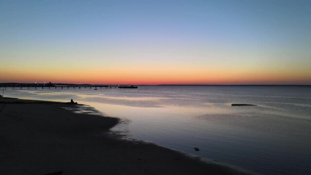 Aerial shot of a beautiful sunset from Cape Cod coastline.