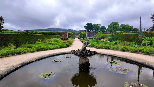 Powerscourt Gardens ornate gold guilded gates,beautiful statue and pond in formal gardens,Wicklow,Ireland Epic locations