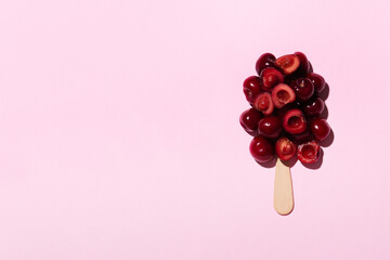 Ripe cherries are laid out in shape like ice cream. Fresh delicious berry ice cream.Summer concept. Top view. Space for text.