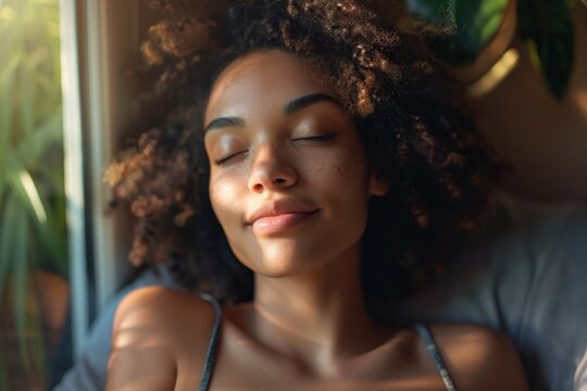 A close-up of a woman taking a deep breath as she wakes up, her chest rising and falling slowly. Her expression is calm and peaceful, capturing the serene moment of waking up and preparing for the