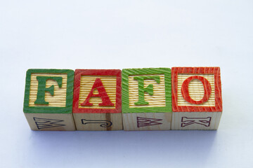 The abbreviation FAFO visually displayed on a clear background with copy space
