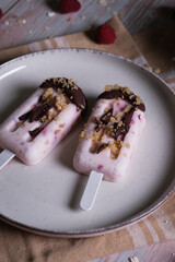 Detail shot of homemade raspberry and oatmeal ice cream.