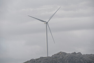 Norwegian Mountain Landscape With One Wind Mill.