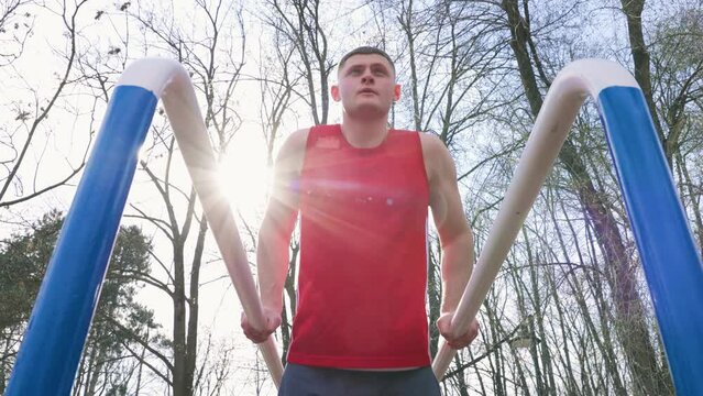 Muscle Definition A Guy's Gymnastics Training Outdoors