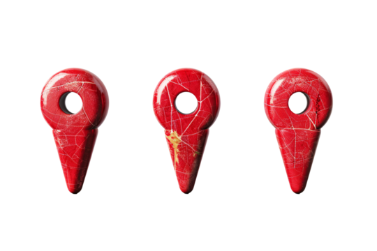 a group of red objects with holes