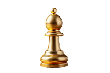 a gold chess piece on a wood surface