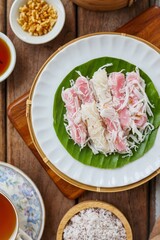 Rice Cake with Coconut Syrup and Rice Cracker., Thai traditional dessert