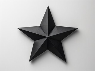Obraz premium Paper black star on white wall
