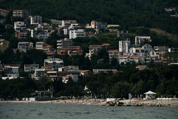 Beautiful view of waving Adriatic sea and mountains in late spring. A popular resort town Bar,...