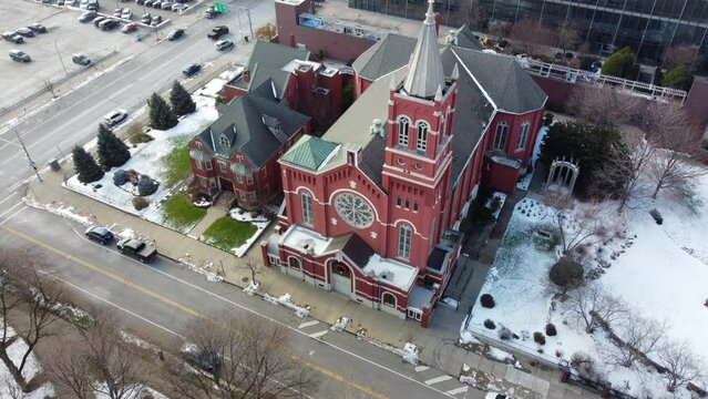 Birds Flying Over Snowy Catholic Church in Rochester, New York