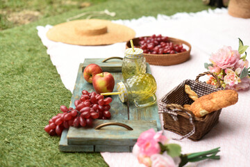 still life with fruits and berries. Picnic in nature in the park