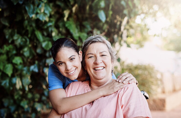 Retirement, senior woman hugging nurse in portrait for assisted living for person with disability and medical care. Healthcare and women with wheelchair for help, support and rehabilitation in garden
