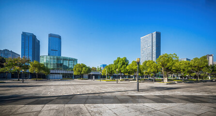 Modern Cityscape with Green Plaza