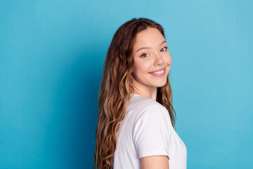 Fototapeta premium Photo of pretty cheerful cute girl wear white stylish pajama empty space isolated on blue color background