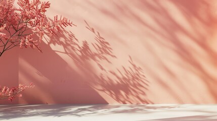 A light salmon wall with the diffuse shadows of coral bells. 