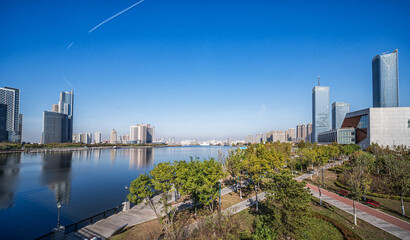 Fototapeta premium Modern Urban Waterfront with Skyscrapers